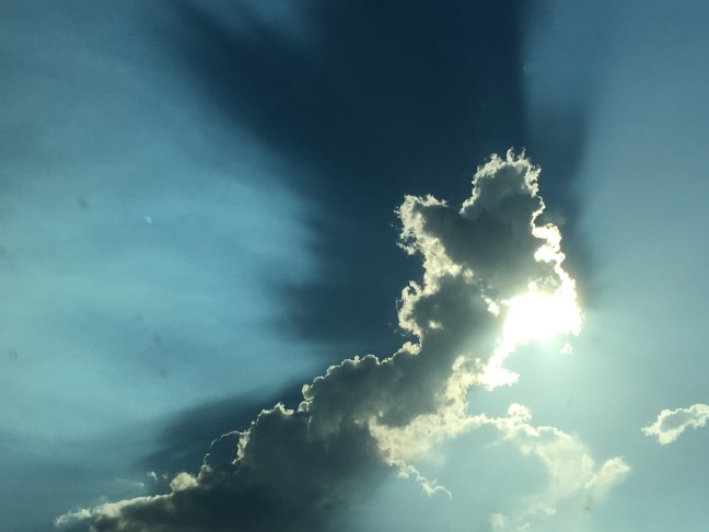 The clouds cast a shadow in the moisture-laden atmosphere.
